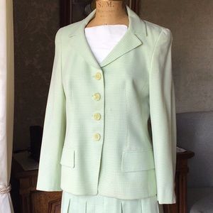 Jacket with pleated skirt